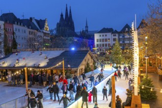 Ice rink at the Christmas market on the Heumarkt in the old town of Cologne, Cologne Cathedral,