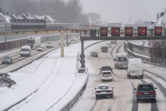 A40 motorway, onset of winter, lots of fresh snow and daytime temperatures below minus 5 degrees,