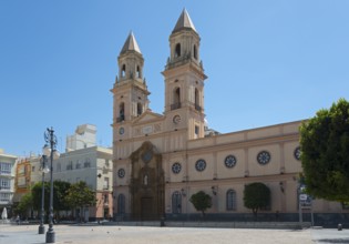 Historic church with two bell towers under a blue sky, Iglesia de San Antonio, Plaza de San