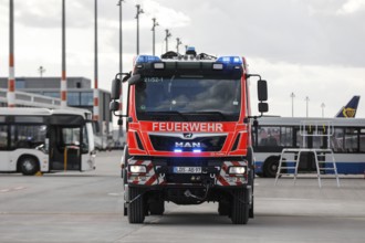 Airport fire brigade fire engine on the BER tarmac during an EASA emergency exercise. Emergency