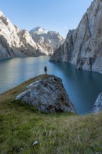 Hiker in front of Kol Suu Mountain Lake, Kol Suu Lake, Sary Beles Mountains, Naryn Province,