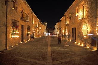 Calle Mayor at night, lit up with candles, Conciertos de las Velas festival of lights, Pedraza,