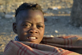 Young shepherdess from the Himba people, Ombombo, Kaokoland, Kunene, Namibia, Africa