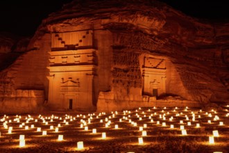 Illuminated Nabataean tombs at night, Hegra or Madain Salih, AlUla region, Medina province, Saudi