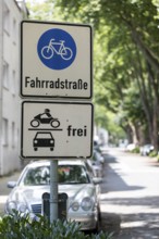 Bicycle road in Essen, cyclists have right of way, cars and motorbikes may also use the road,