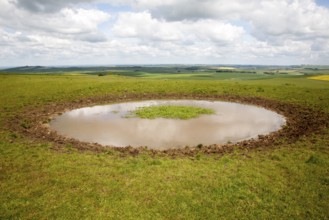 Dew pond water supply on the top of Tan Hill, All Cannings, Wiltshire, England, United Kingdom,