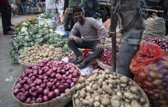 Vendor selling vegetables at a market, ahead of the presentation of the Interim Budget 2024 by