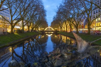 Christmas market, on Königsallee, Kö, Stadtgraben pond, Tritonenbrunnen fountain, Christmas lights,