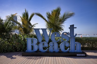 Lettering, logo, waterfront promenade, Nakheel West Beach, The Palm Jumeirah, Dubai, United Arab