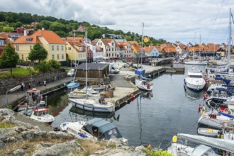 The harbor with many leisure boats in Gudhjem, Bornholm, the Baltic Sea, Denmark, Scandinavia,