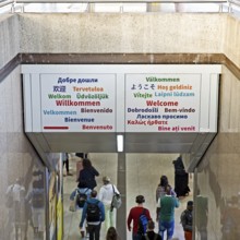 Welcome greeting in twenty-one languages at Düsseldorf Central Station, Migration, North