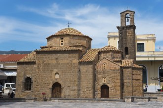 Old church with stone walls and a domed roof under a blue sky, Byzantine church, Church of the