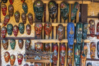 Traditional wooden masks on a market, colourful, handcraft, craftsmanship, tradition, face, travel,