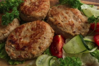 Fried cutlets, turkey, with vegetable salad, top view, no people