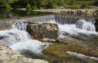 Waterfalls with limestone cliffs of the Sautadet cascades near La Roque-sur-Cèze, Gard department,