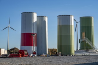 Construction site of a new wind turbine, modules of the tower, wind turbine from the manufacturer