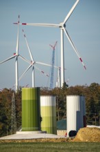 Construction site of a new wind turbine, modules of the tower, wind turbine from the manufacturer