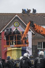 2nd day of the eviction of the Lützerath hamlet, occupied buildings of the former farm, by climate