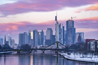 The skyline of Frankfurt am Main, skyscrapers of the banking district, Flößerbrücke, wintry