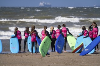 Course for surfers, surfing beginners, on the beach of Scheveningen, Netherlands