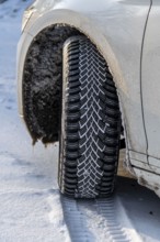 Winter tyres, driving on a road with snow cover, grip on the snow thanks to the special tread and