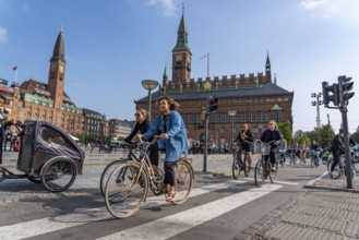 Cyclists on cycle paths, Radhuspladsen, City Hall Square, in the city centre of Copenhagen,