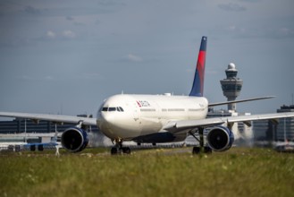 Amsterdam Schiphol Airport, Delta Jet on the taxiway, to the Polderbaan runway, Tower, Amsterdam,