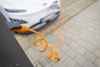 Electric cars at charging stations, Dresden, Saxony, Germany, Europe