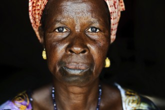 Portrait of a woman with traditional lip tattoo Gambia . She belongs to the Fula ethnic group