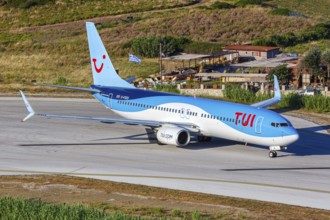 A TUI Airways Boeing 737-800 aircraft with the registration G-FDZS at Skiathos Airport, Greece,