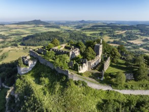 Aerial view of the volcanic cone Hohentwiel with Germany's largest fortress ruins, on the horizon