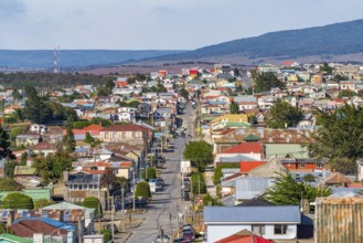 View over hills, streets and colourful houses made of wood and corrugated iron, city of Punta