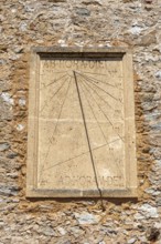 Sundial on the church L'église Saint Trophyme in Bormes les Mimosas, Provence-Alpes-Côte d'Azur,