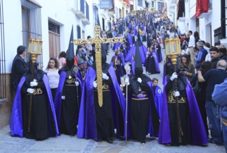 Easter Christian religious procession through streets of Setenil de las Bodegas, Cadiz province,