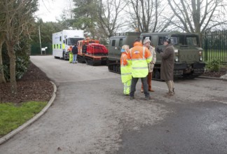 Flooding on the Somerset Levels, England in February 2014, emergency vehicles at Huish Episcopi