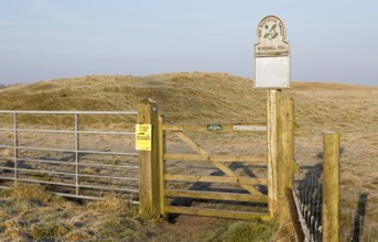 National Trust sign at gateway entrance to Windmill Hill, a Neolithic causewayed enclosure, near