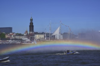 Europe, Germany, Hamburg, Elbe, View across the Elbe to the Michel, Fire boat in action at the