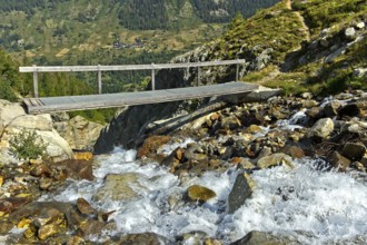 Narrow bridge over the Nästbach torrent on the way to the Bietschhorn hut, near Blatten,