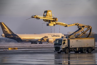 Winter at Frankfurt Main Airport, FRA, de-icing vehicles waiting for aircraft to be de-iced, Hesse,