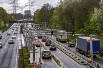 Weighing and barrier system on the A42 motorway, in front of the dilapidated motorway bridge over