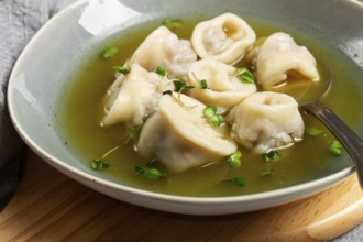 Cappelletti with meat in chicken broth, ravioli with meat, homemade, no people