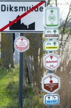 Bike node sign and 14-18 front route signposts giving directions for cycling routes, bicycle