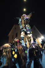 Witch figures on a night carnival parade with illuminated costumes, carnival, Schellbronn night