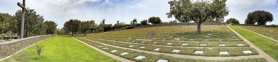 Panoramic photo wide view over part of German military cemetery inaugurated in 1974 by Volksbund