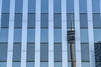 The Rhine Tower reflected in a glazed façade, RWI building, Düsseldorf, North Rhine-Westphalia,