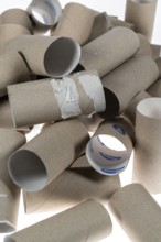 Pile, mountain of empty, used toilet paper rolls