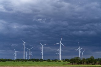 Wind farm east of Geilenkirchen, dark storm clouds, strong wind, North Rhine-Westphalia, Germany,