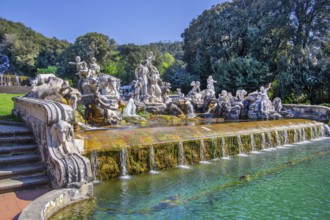 Fountain sculptures at the water basins in the garden of the royal palace Palazzo Reale, Italian