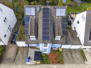 Detached house with various solar modules, in addition to normal standard solar panels, PV tube