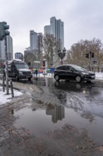 Puddle, winter in the city, Deutsche Bank building, Sparkasse, Trianon Frankfurt building,